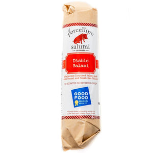 A product photo of il porcellino salumi's Diablo salami in packaging with a white background.